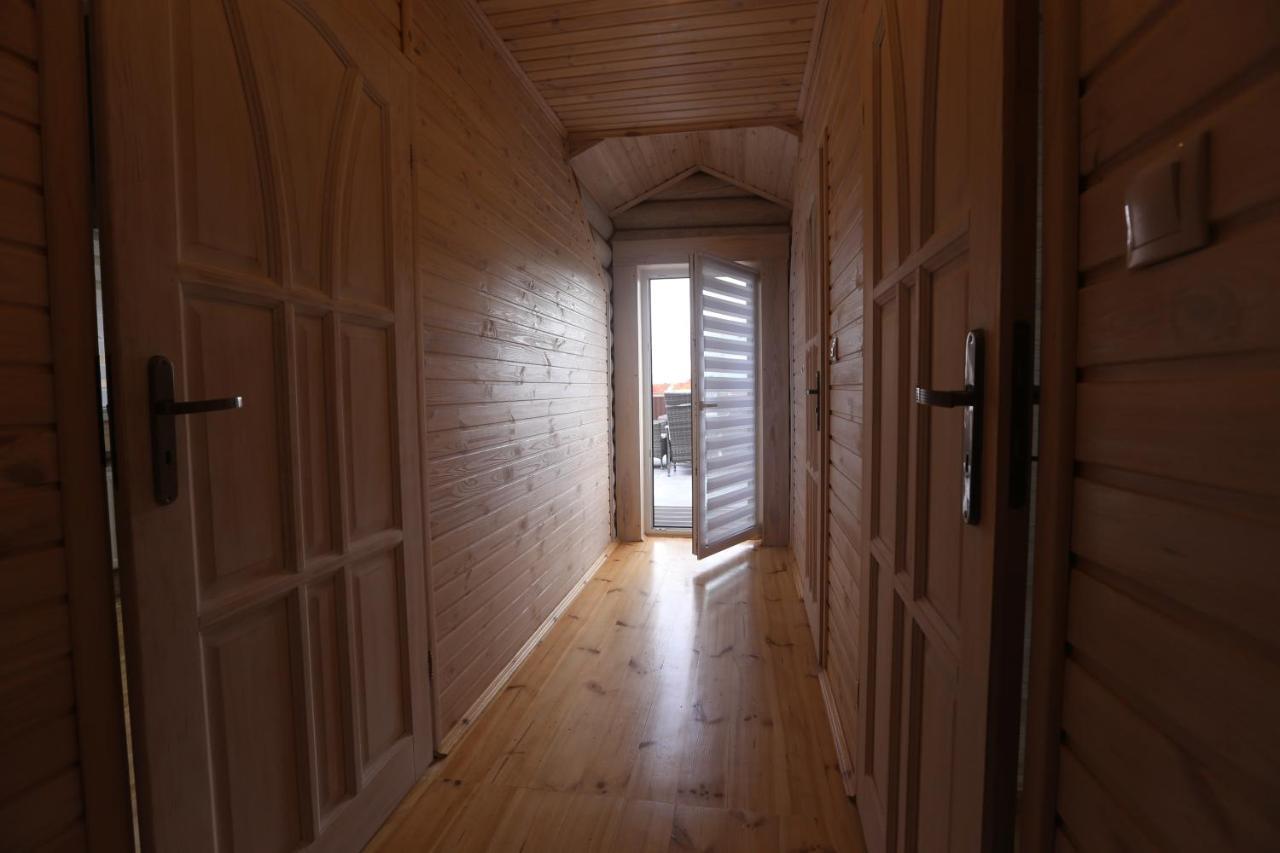 Sosnowe Domki Rewal Esterno foto